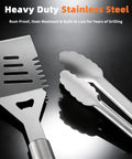 Close-up of 32 Piece Heavy Duty Stainless Steel BBQ Grill Tool Set With Case Including Spatula and Tongs.