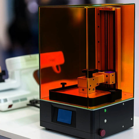 No Nonsense Heavy Duty Orange Laser Safety Shield Featuring Solid Optical Density Filter Blocking Harmful Ultraviolet And Blue Light Up To Five Forty Nm For Pro Shop Applications displayed on a laser machine.