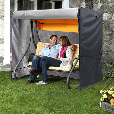 Couple sitting on a swing with Triple Seater Hammock Swing Cover For Outdoor Use Waterproof And UV Resistant All Weather Shield 81x49x67 Inches