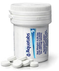 Trailhead Ready Water Purification Tablets 397Mg 100 Count in container, shown with tablets, suitable for water safety on adventures.