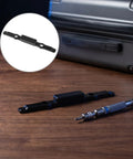 Rock Solid Luggage Pull Handle Replacement Button For Telescopic Suitcases on wood surface with screwdriver beside it.