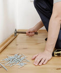 Pro Grade Double Head Skirting Nails That Go Down Smooth For Invisible Baseboard Fastening Rust Proof Galvanized Steel And A Slick Seamless Wood Trim Finish 300 Piece Kit, hammering nails into wood trim.