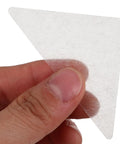 Eighty Piece Pack Of Invisible Adhesive Shirt Collar Stays white PVC collar stay held in hand, ideal for keeping collars crisp.