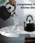 2 Quart Stainless Steel Whistling Tea Kettle For Stovetop No Fuss Quick Boil With Spill Proof Lid in black on kitchen counter