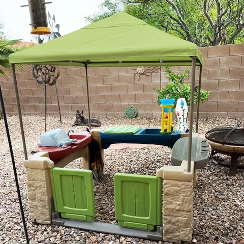All Around Playtime Patio Canopy Replacement For Outdoor Play Kitchen Playset in green providing shade for kids' playhouse