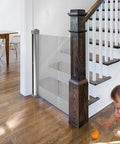 Retractable Baby And Pet Safety Gate 54 Inch Wide 34 Inch Tall for Doorways Hallways and Stairs Kid and Pet Safe, installed at stairs