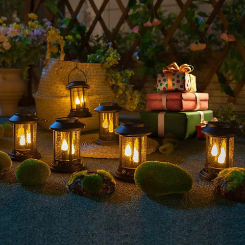 Outdoor setup with Six Pack Solar Lantern Lights With Realistic Flickering Candle Effects No Wiring Easy Setup Stakes For Garden