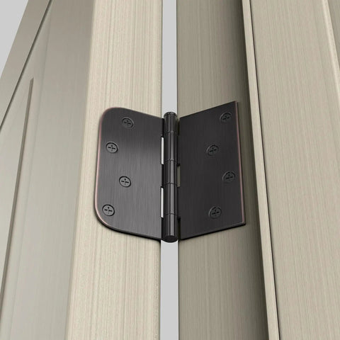 Top Shelf Oil Rubbed Bronze 4X4 Interior And Exterior Door Hinges Smooth Swinging Action showing installation on a door.