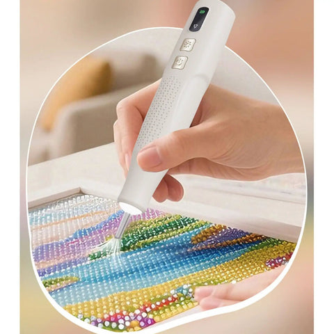 Badass Cordless Electric Pickup Pen With Reliable Vacuum Grip To Snag Loose Bits Zero Sweat For Desk Projects Plus Bright Light And Smooth Angled Tip For Crisp Workflows in hand, picking up colorful beads.