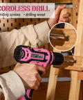 Badass Pink 12V Cordless Drill Driver Kit for Women With Legit Storage Case Built for Weekend Warriors and DIY Besties Ready to Nail Any Home Project Smooth Operator Heavy Duty Repair Tool Set Renewed drilling into wood.