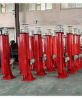 Kick Ass Dual Mode Telescopic Mast Electric Motor With Manual Hand Crank Backup, red aluminum antenna poles in workshop.