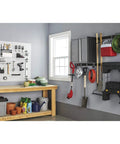 Garage with Must Have FastTrack Garage Hook Set 6 Pack Heavy Duty Powder Coated Metal Hangers, tools, and equipment organized on wall.