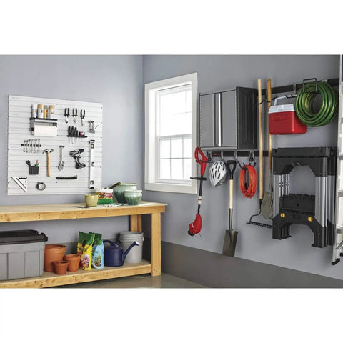 Garage with Must Have FastTrack Garage Hook Set 6 Pack Heavy Duty Powder Coated Metal Hangers, tools, and equipment organized on wall.
