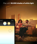 Couple enjoying mood lighting from A19 smart bulb, app controls visible. Get Your Hands On This Awesome A19 Smart Bulb That Gives You 16 Million Colors To Light Up Any Lamp Or Overhead Light Just Right Needs A Smart Hub To Work And Plays Nice With Alexa For Hands Free Voice Control This Is The Older Version But Still Kicks.