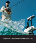 54 Inch Saltwater Trolling Motor With FreeSteer Joystick Remote and Precision GPS Anchoring used by an angler in a marine setting.