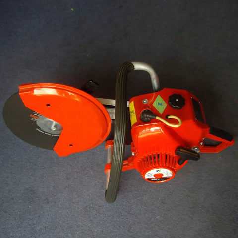 Professional Grade Hardcore Cordless Gas Concrete Saw Cuts Like Crazy For All Day Demolition Grinds And Crushes Steel Marble And Brick Without Breaking A Sweat On The Job Site, top view, red gas saw with blade.