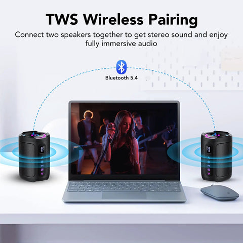 Portable Bluetooth Speaker With LED Light, Outdoor Waterproof Speaker For Travel, Sports And Parties next to laptop