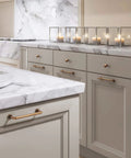 Antique Brass Cabinet Pulls Set For Vintage Farmhouse Kitchen And Wardrobe Hardware installed on modern kitchen cabinets