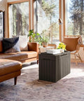 31 Gallon Resin Deck Box Waterproof Outdoor Storage For Patio Cushions And Garden Tools Brown Durable Weatherproof Chest placed indoors