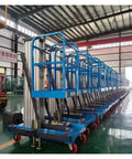 Heavy Duty Electric Personal Lift Single Mast Aluminum Telescopic Platform in warehouse with multiple units ready for use.