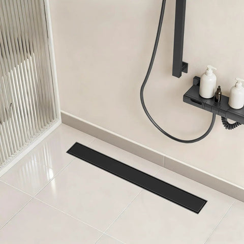 24 Inch Linear Shower Drain Tile in Grate Matte Black Floor Drain Kit No Flange installed in contemporary bathroom setting.