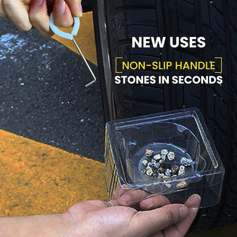 Slick Steel Shower Drain Hook With Soft Silicone Grips And Easy Pull Strip Feature For Hassle Free Drain Cover Removal Plus Linear Grate Extraction In No Sweat Bathroom Set Gray, shown in use with a tire, lifting stones easily.