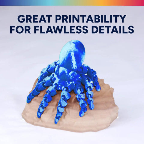 Top Shelf Silk PLA Filament 1.75mm 3D Printer Spool features a vibrant blue octopus model with smooth details on a base.