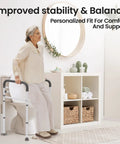 Rock Solid Toilet Safety Rails For Seniors With Dang Good Grip Handles And No Sweat Setup Bathroom Assist Frame aiding a senior in a bathroom.