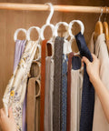 Slick Closet Organizer And Scarf Hanger That Crushes Your Morning Clutter With Wide Loops For Quick Belt Tie And Hijab Storage A Total No Sweat Daily Essential And Big Time Gift, holding multiple scarves.