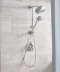 Chrome Replacement Handheld Showerhead With Four Function Eco Performance WaterSense Certified installed in modern bathroom.
