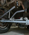 Underside view of Beefy 3/4 Inch Heim Joint Rod End Kit With Heat Treated Chromoly Sleeves for custom auto builds.