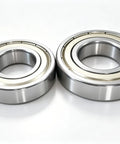 Slap On This Heavy Duty Washer Tub Bearing Seal Kit To Stop Grinding Groans And Drum Leaks Fast Your Machine Will Run Like New For Smooth Quiet Laundry Days Ahead. Close-up of two shiny metal bearings.