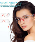 Badass Silicone Safety Glasses For Construction Work, Shatterproof Polycarbonate Lenses That Are Ridiculously Lightweight, Pack Of Four showing clear lenses with red accents on a model.