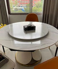 Thick 80cm Lazy Susan Turntable With Black Wood Grain Base Slays As Slick Rotating Dining Tray on a marble table.