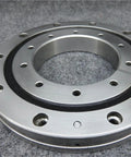 RU148 Crossed Roller Ring Bearing Heavy Duty Slewing Component For Humanoid Robot Arms 90 Mm Id 210 Mm Od 25 Mm Thick showing detailed steel surface.