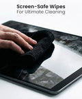 Person using Streak-Free Screen Cleaner Wipes For TV, Computer, Laptop, iPad And Monitor With Microfiber Cloth on tablet screen