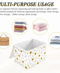 Rock Solid Foldable Storage Bin with Lid and Carrying Handles Collapsible Fabric Organizer Super Sturdy Closet Box Dust Proof Cube for Bedroom and Home Office Space Saver with floral design holding clothes.