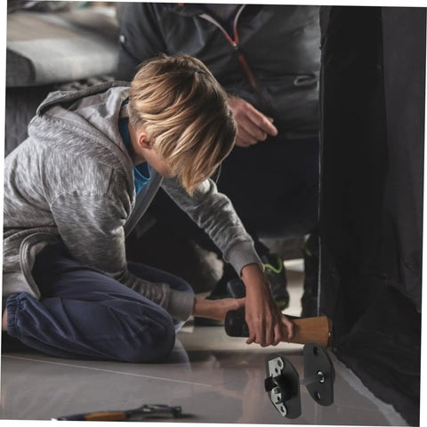 Child assisting adult with Top Shelf Pin Style Sectional Sofa Connectors Heavy Duty Couch Brackets installation under furniture.