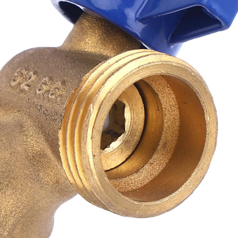Close-up view of Top Tier 1/4 Inch Solid Brass Quarter Turn Ball Valve with blue handle for plumbing systems.