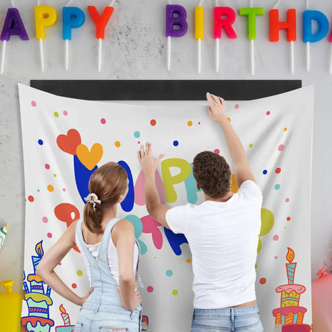 Two people using Heavy Duty Hook And Loop Tape Adhesive Roll 4.4 Inch By 16.5 Foot Black Velcro Strips For No Punch Wall Mount to hang a birthday banner.