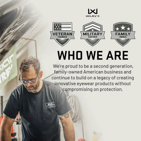 Active Safety Sunglasses Featuring Shatterproof Captivate Black Mirror Lenses worn by a man in a workshop.