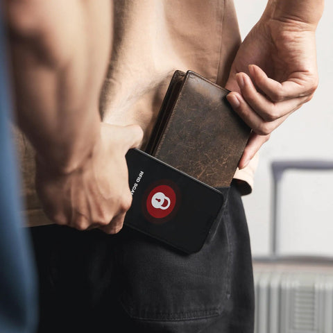 Two Pack RFID Blocking Cards For Wallet Protect Your Credit Debit And ID From NFC Skimming In Business Or Travel No Batteries Needed Durable Shield For Contactless Cards in use, shielding a wallet from scanning device.