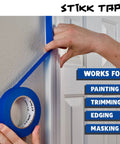 Applying Blue Painters Tape 2 Inch Wide 60 Yards Per Roll 24 Roll Case Residue Free Easy Release Medium Tack on door trim