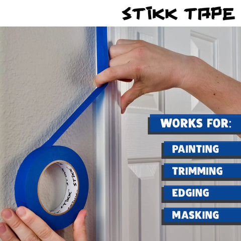 Applying Blue Painters Tape 2 Inch Wide 60 Yards Per Roll 24 Roll Case Residue Free Easy Release Medium Tack on door trim