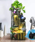 Decorative fountain with Submersible Fountain Pump With 400 GPH 1800 LPH, Ultra Quiet 25W, 12 LED lights, and plant details