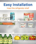 No Fuss Fridge Drawer Organizer Slides Under Shelf For Crisper Bin Storage With Slick Gliding Rails, holding carrots, yogurt, drinks, and condiments.