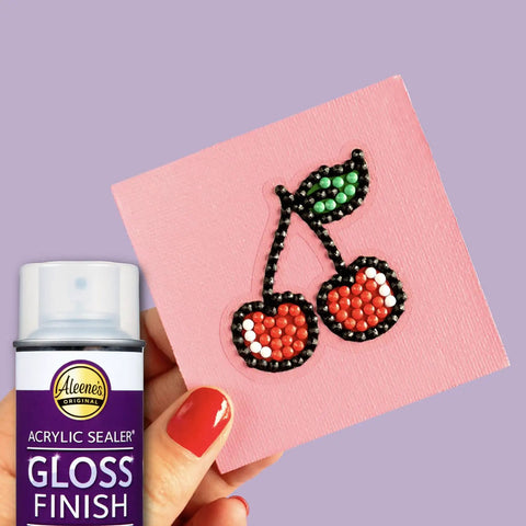 Spray Gloss Finish Acrylic Sealer 6 Oz Clear Coat for DIY indoor projects, shown with glitter cherry decor