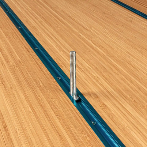 Top Grade 5 16 Inch 18 T Track Bolts 20 Pack 2 1 2 Inch Long T Slot Nuts shown in routing groove for woodworking jigs.