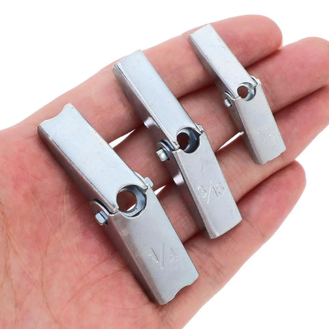 Three carbon steel toggle bolts from 48 Piece Heavy Duty Drywall Anchors Toggle Bolt And Wing Nut Kit in a hand