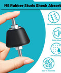 M8 Rubber Studs Shock Absorber for vibration damping, held between fingers, ideal for compressors and pumps in workshop.